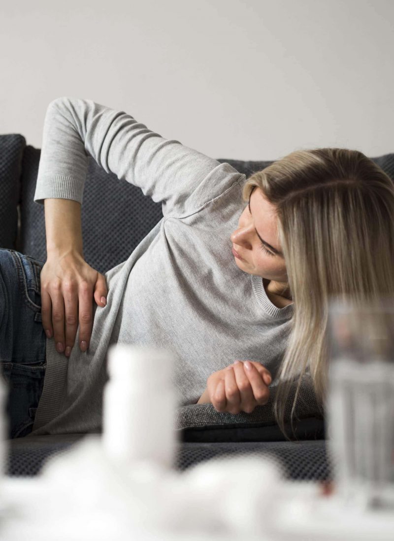 medium-shot-woman-couch-2-scaled.jpg